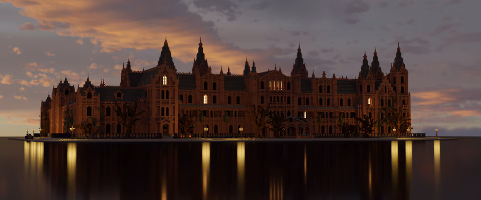 Image of a large, Victorian style estate hotel against a sunset sky filled with pinks and purples