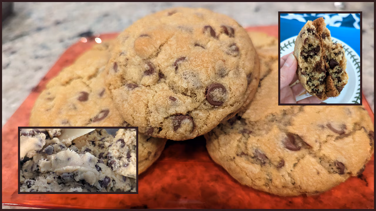 Photo of a pile of chocolate chip cookies atop a red napkin on a granite countertop