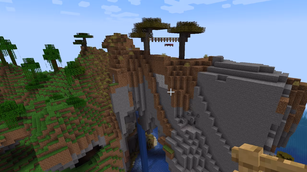 A Minecraft screenshot depicting a cliff in the Overworld.