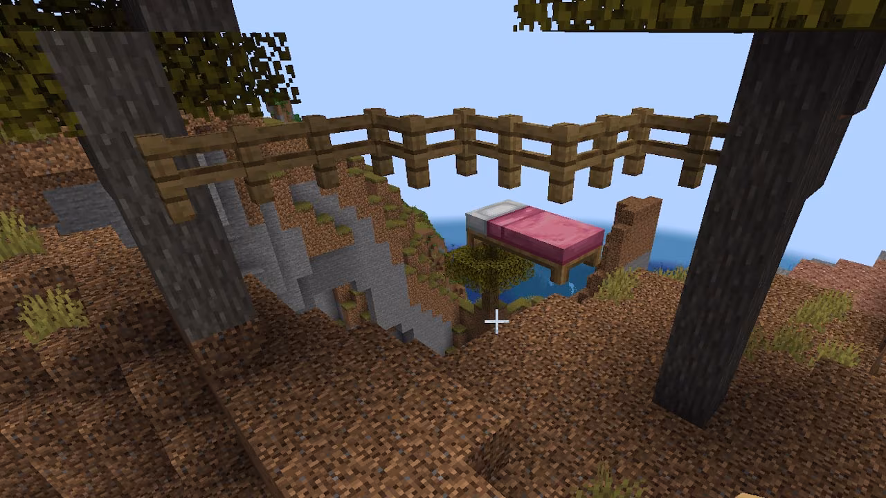 A Minecraft screenshot depicting a fence and a bed floating in the air.