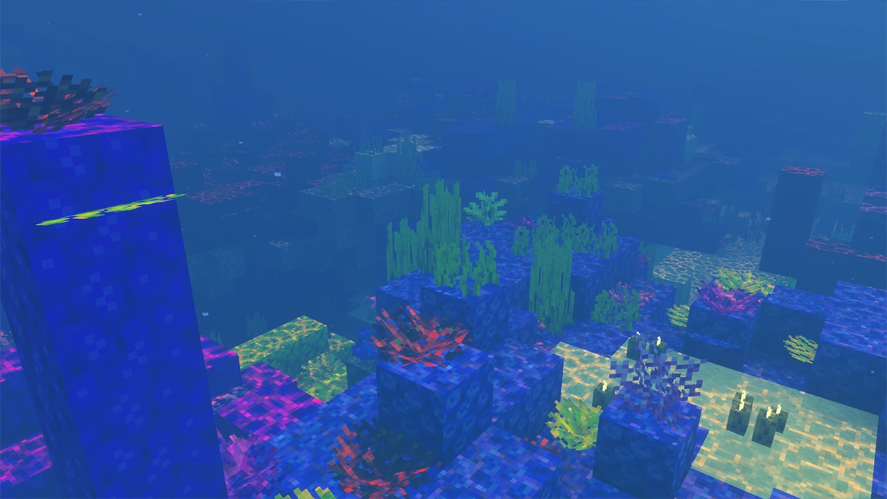 Underwater Minecraft scene with colourful coral, seaweed, and glowing blocks. The water is deep blue, filled with vibrant marine life and shimmering light.