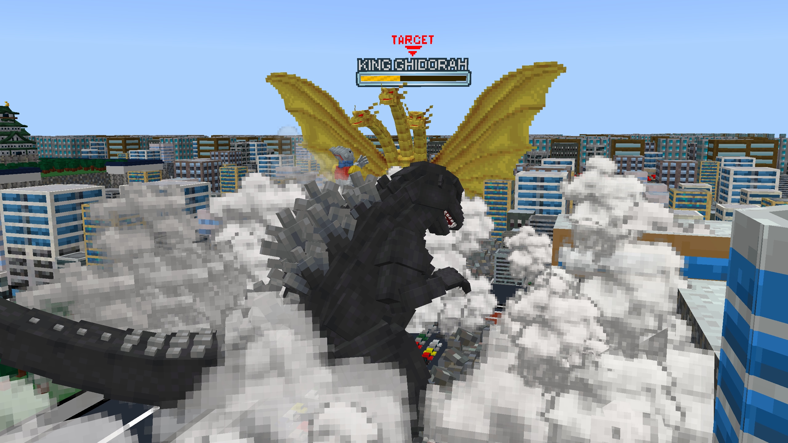 Godzilla and a three-headed monster in a smoke cloud