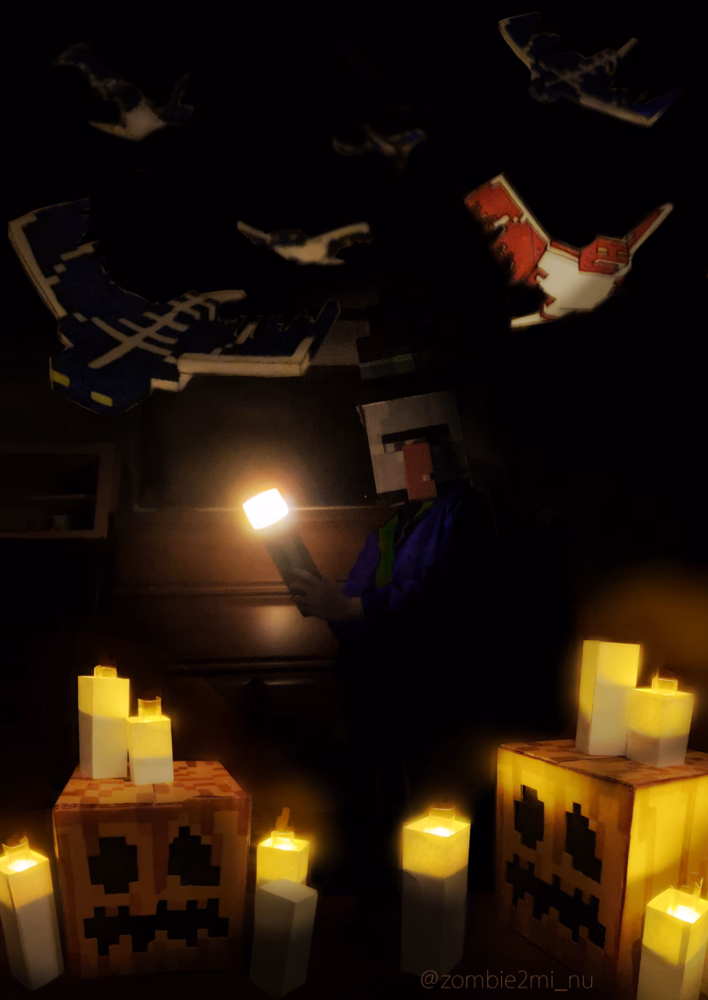 Image of a person cosplaying as a Minecraft villager holding a torch with digitally added Minecraft bats, jack-o-lanterns, and candles in the foreground