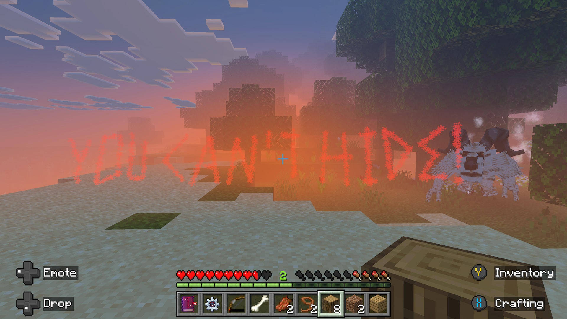 Minecraft screenshot of a sunset where the text "YOU CAN'T HIDE!" in red covers the screen and a horned figure approaches from the side