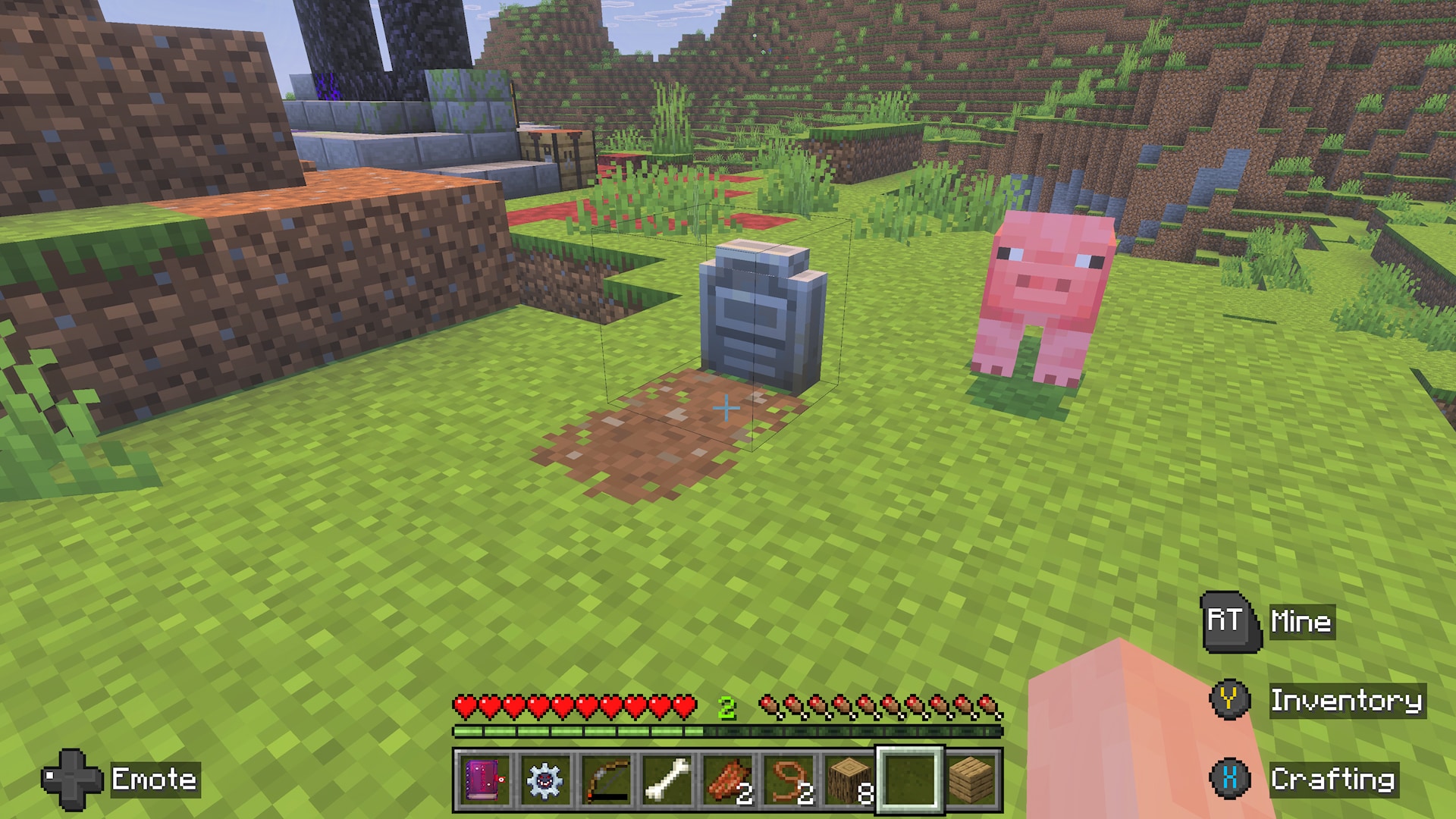Minecraft screenshot of a grassy landscape with a pink pig next to a grey gravestone with newly dug dirt in front.