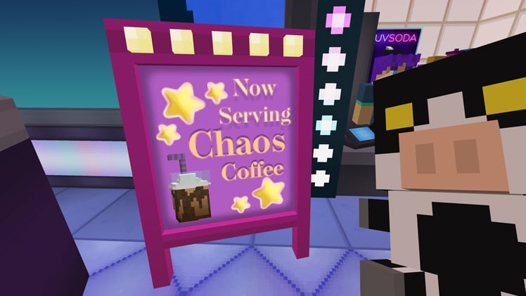 The article author in front of a coffee sign.