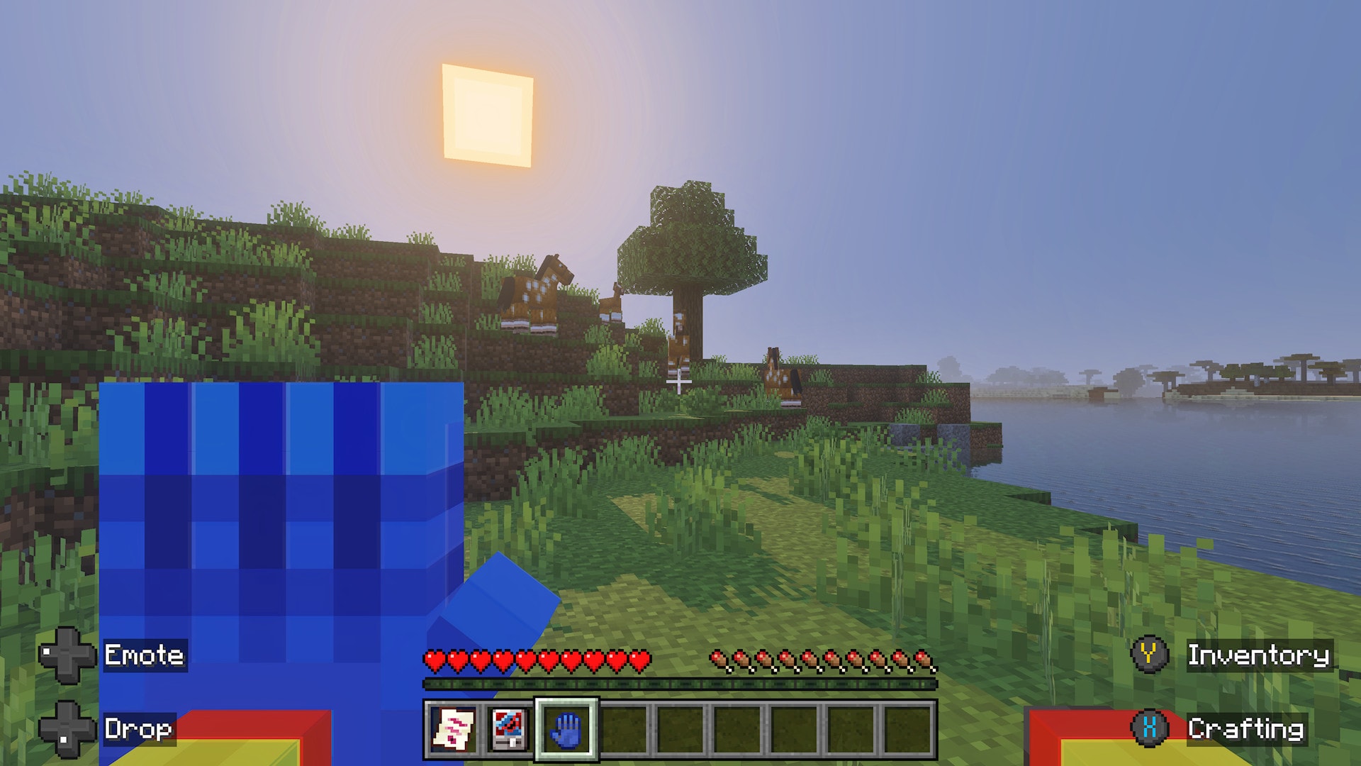 A screenshot from the Huggy & Friends add-on, featuring the player's blue hand