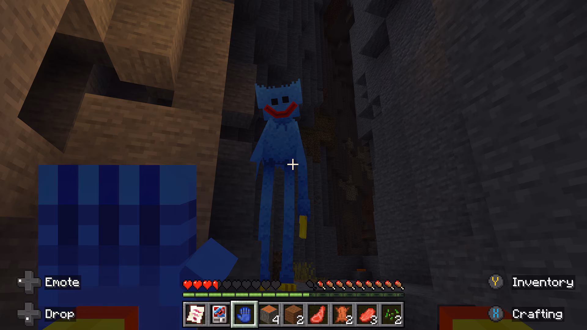 A screenshot of the blue creature from the Huggy & Friends add-on