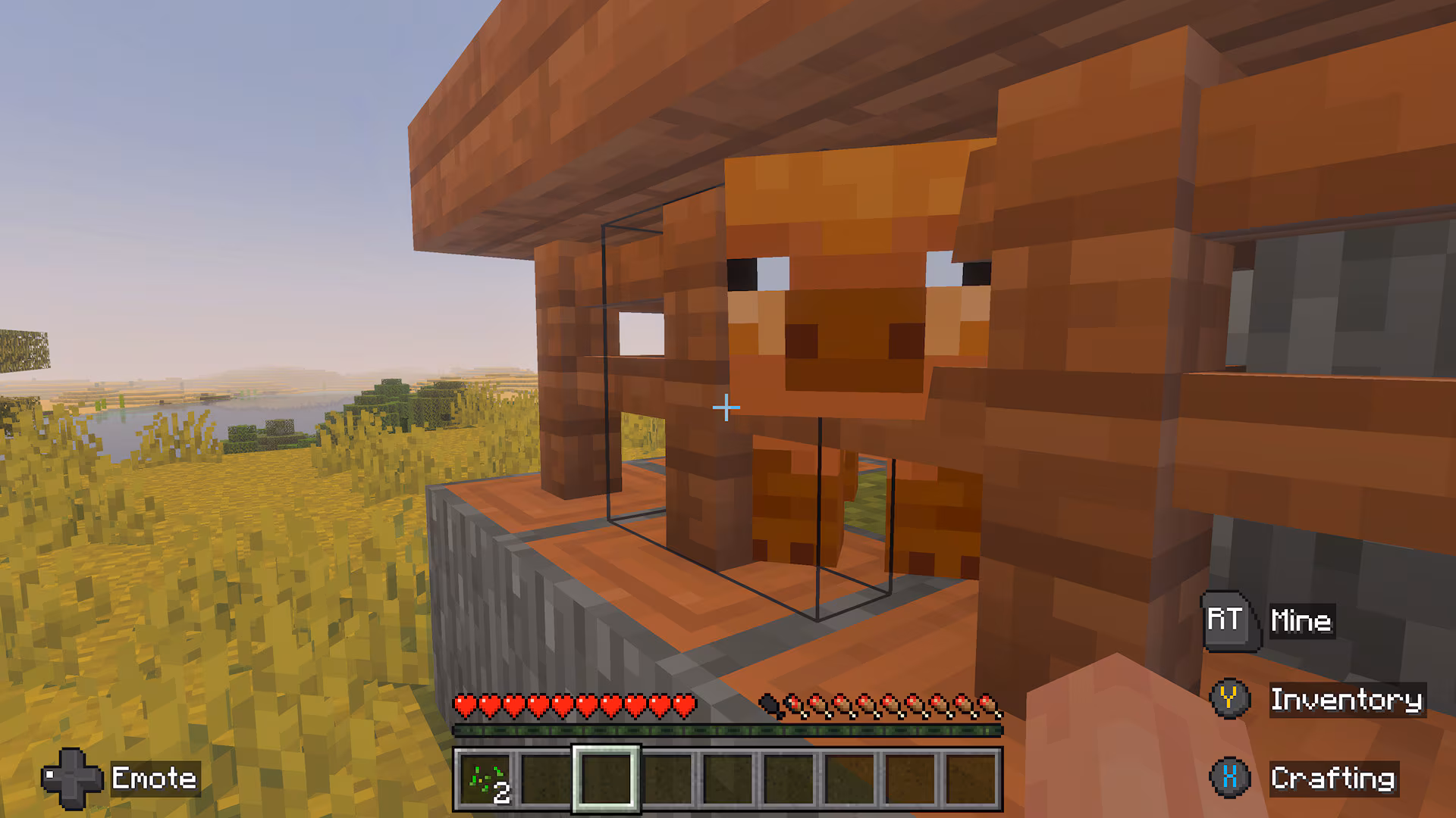 A screenshot of pigs in a pen
