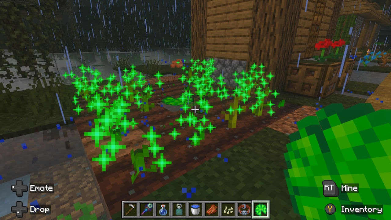 Green sparkles appear over crops in the rain, indicating magical growth effects. The player holds a glowing green item.