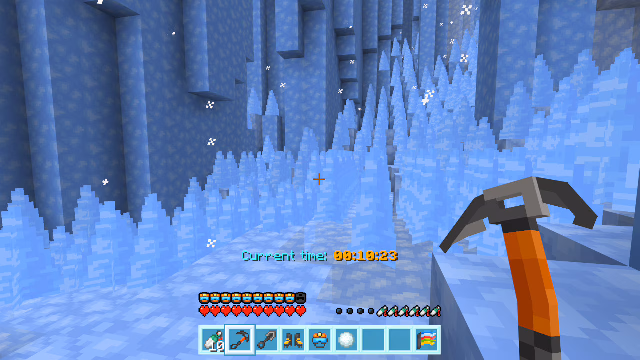 Narrow ice corridor filled with tall blue ice spikes as a climber advances with an ice pick