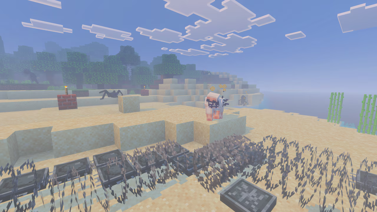 A Minecraft character stands amid traps and barbed wire on a foggy beach while hostile creatures lurk nearby.