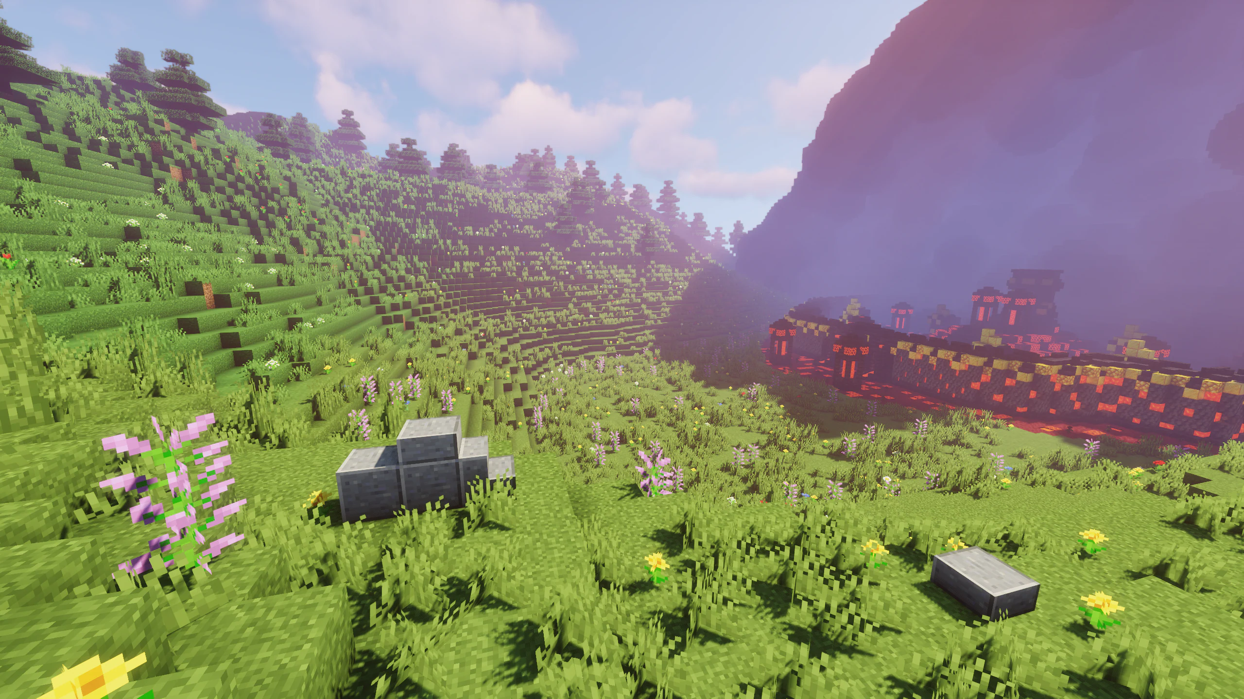 Image created in Minecraft of a sprawling green pasture with a hill to the left, bright blue sky behind with white clouds, and an impending fortress to the right glowing with orange and red hues and smoke cloud approaching.