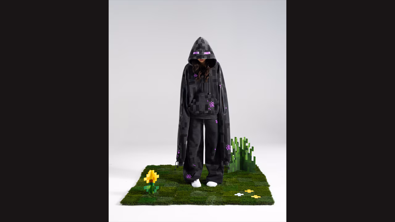 A photo of a model wearing the Enderman hoodie and sweatpamts