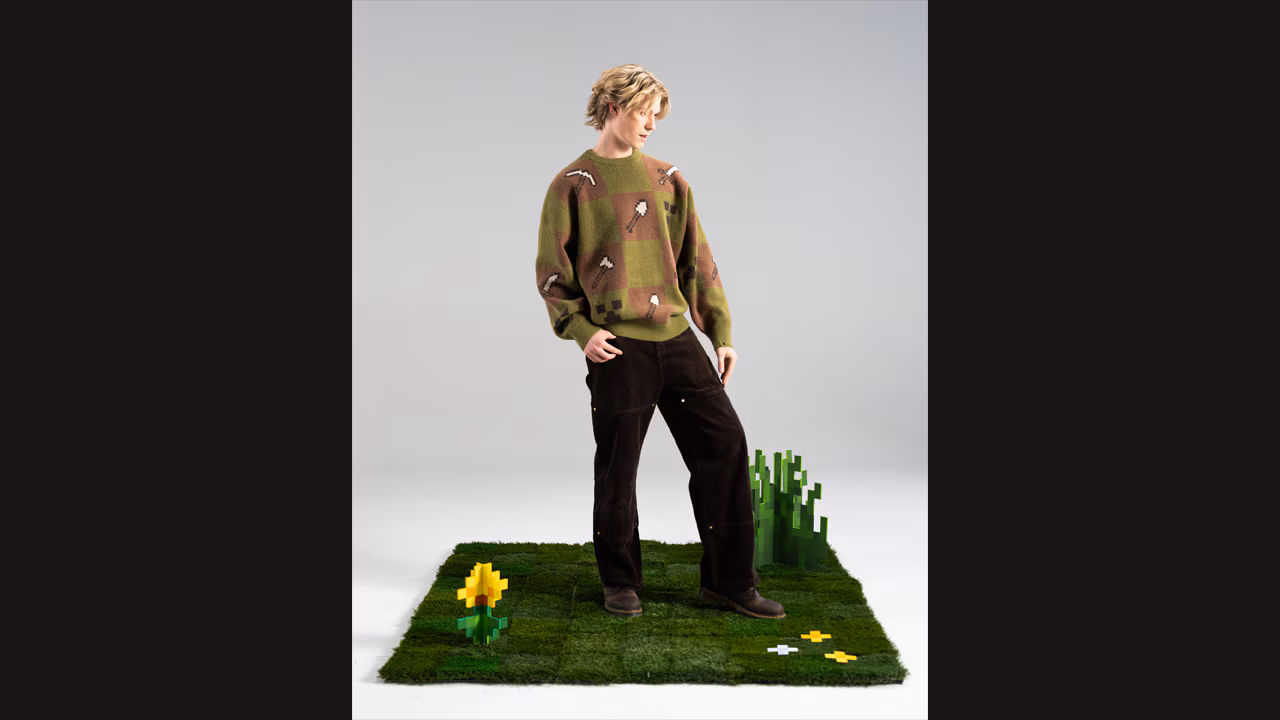 A photo of a model wearing the Tools of the Trade sweater and Crafting pants