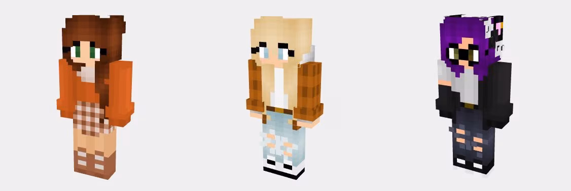 Image featuring a trio of characters from Minecraft against a white background wearing a variety of fall inspired outfits. On the left is a burnt orange long sleeved top with a plaid skirt, the middle is burnt orange plaid flannel over a white top and jeans that are ripped at the knee, and on the right is a black droopy cardigan falling off the shoulder over a grey shirt and black jeans that are torn at the knees.  