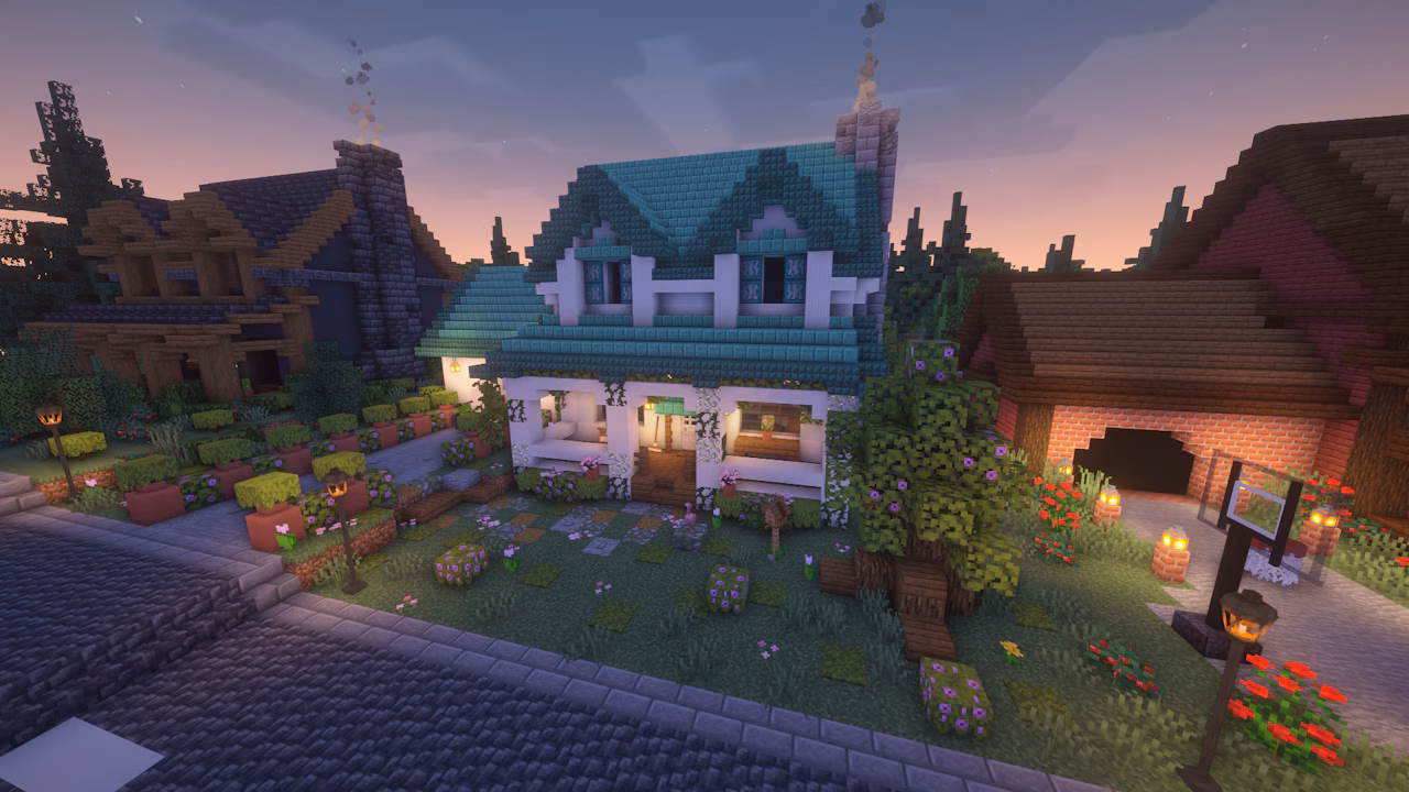 A neighborhood in Minecraft, featuring three different types of houses on a street.