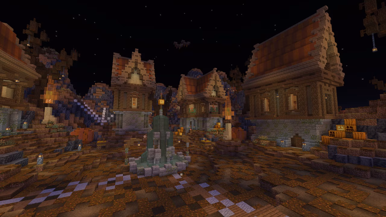 Spooky autumn village square with pumpkins at night.