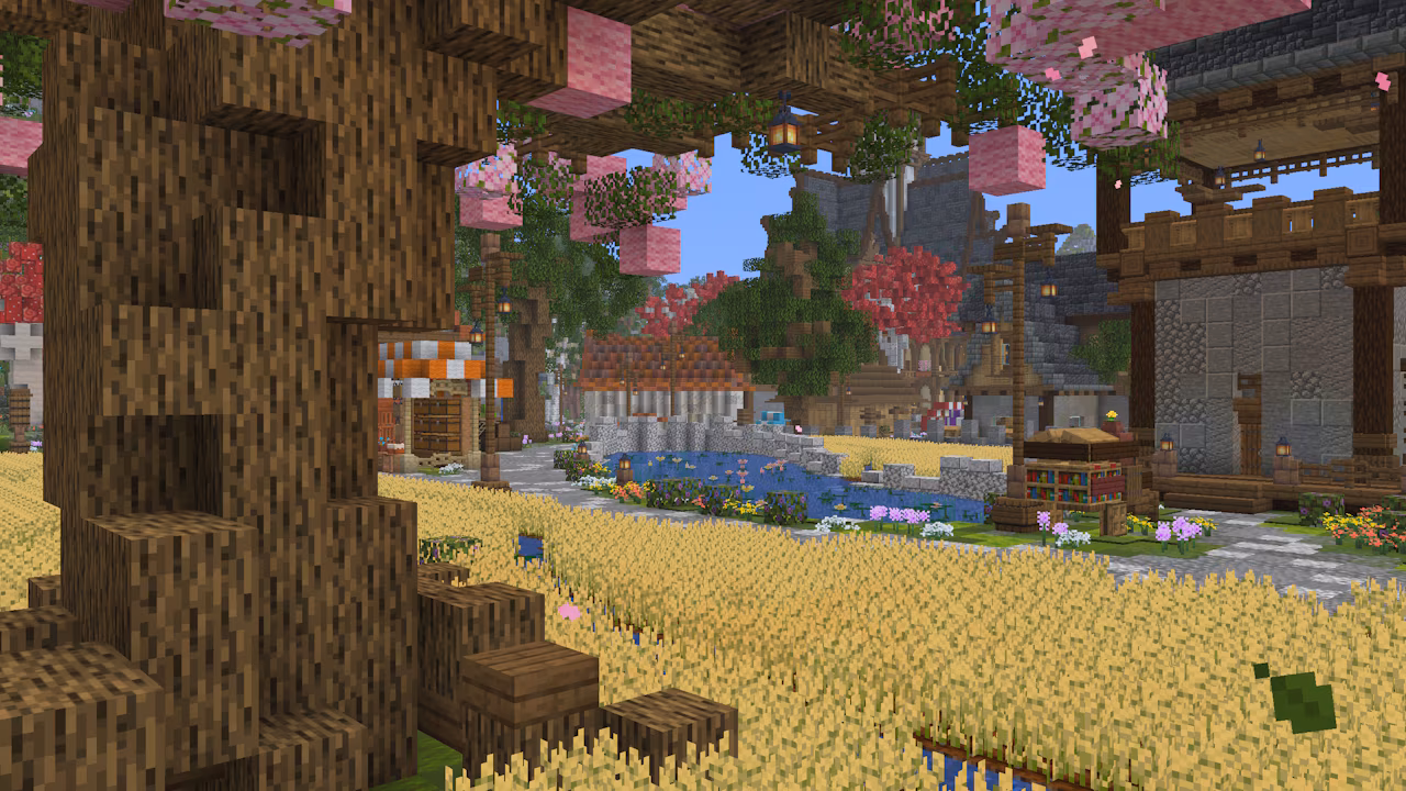 Peaceful village with pond, cherry trees, and wheat field.