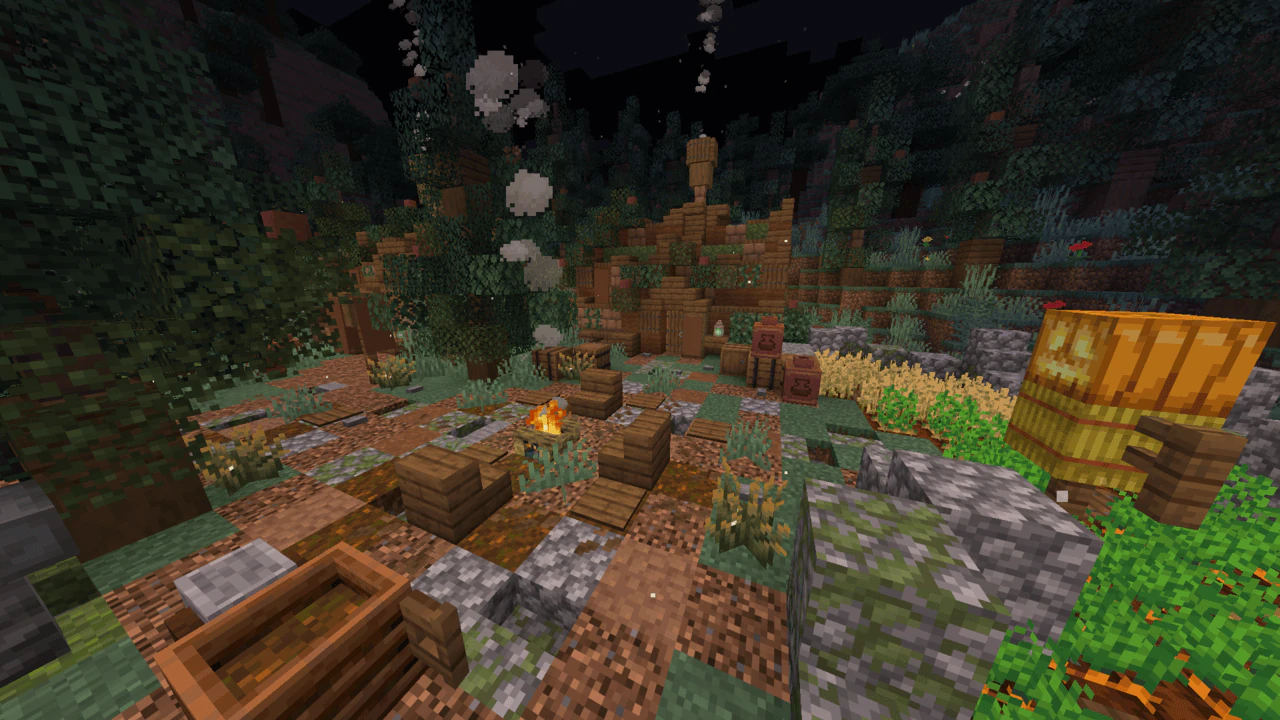A rustic campsite with a small campfire, wooden seating, crops, and cabins sits among dense forest under a nighttime sky.
