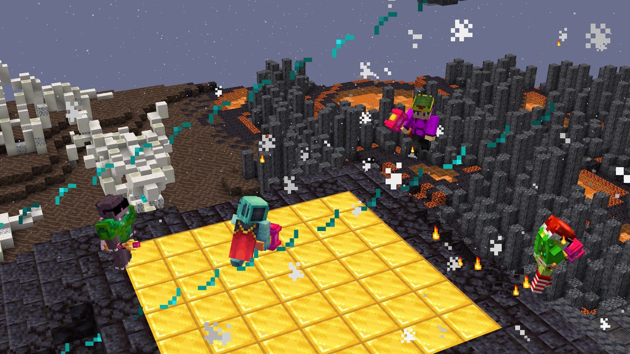 A screenshot of some players on top of a temple with gold blocks.