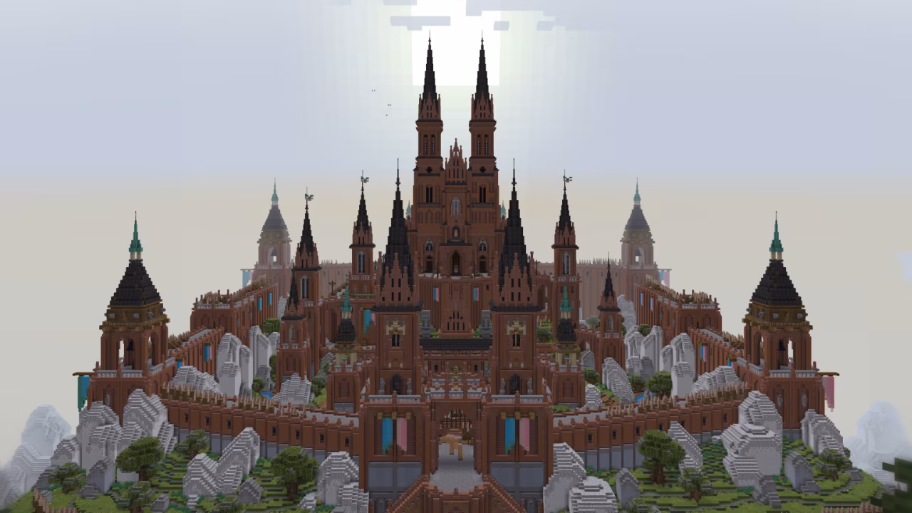 A large brown renaissance castle with a clear sky.