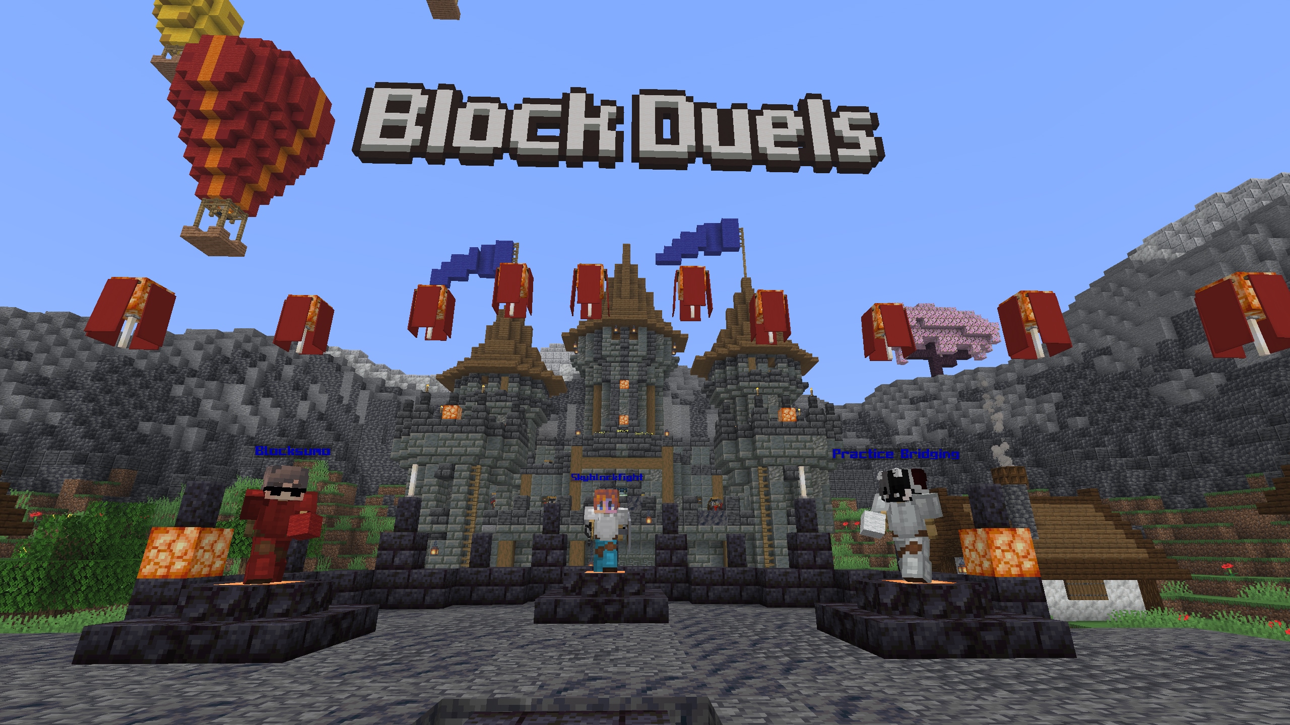 A Minecraft screenshot, depicting a castle, with a balloon floating in the sky.