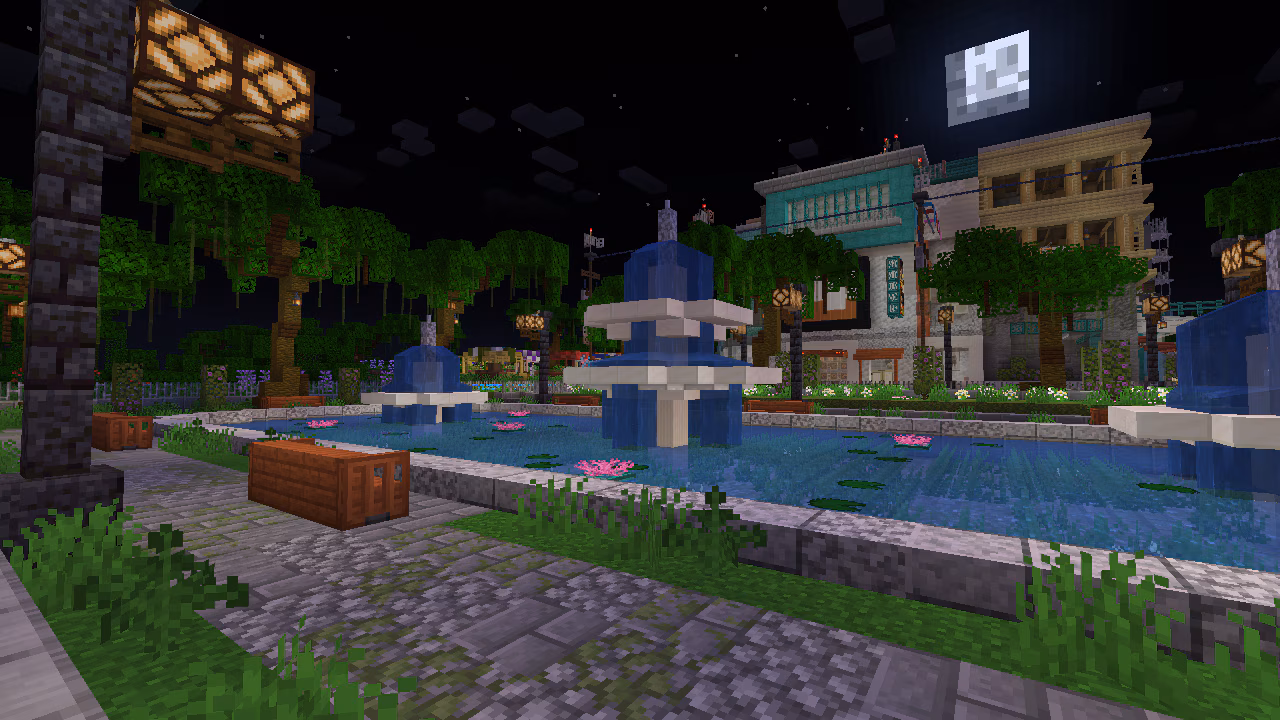 A Minecraft screenshot, depicting a fountain, with a neighborhood in the background.