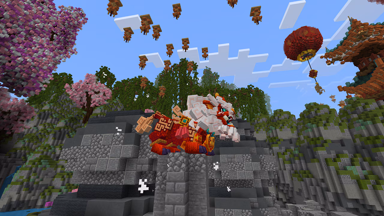 This image from Monster Attack: Nian by Next Studio shows the fearsome Nian looks out over a village complete with a beautiful temple and cherry blossom trees, while lanterns float through the sky.