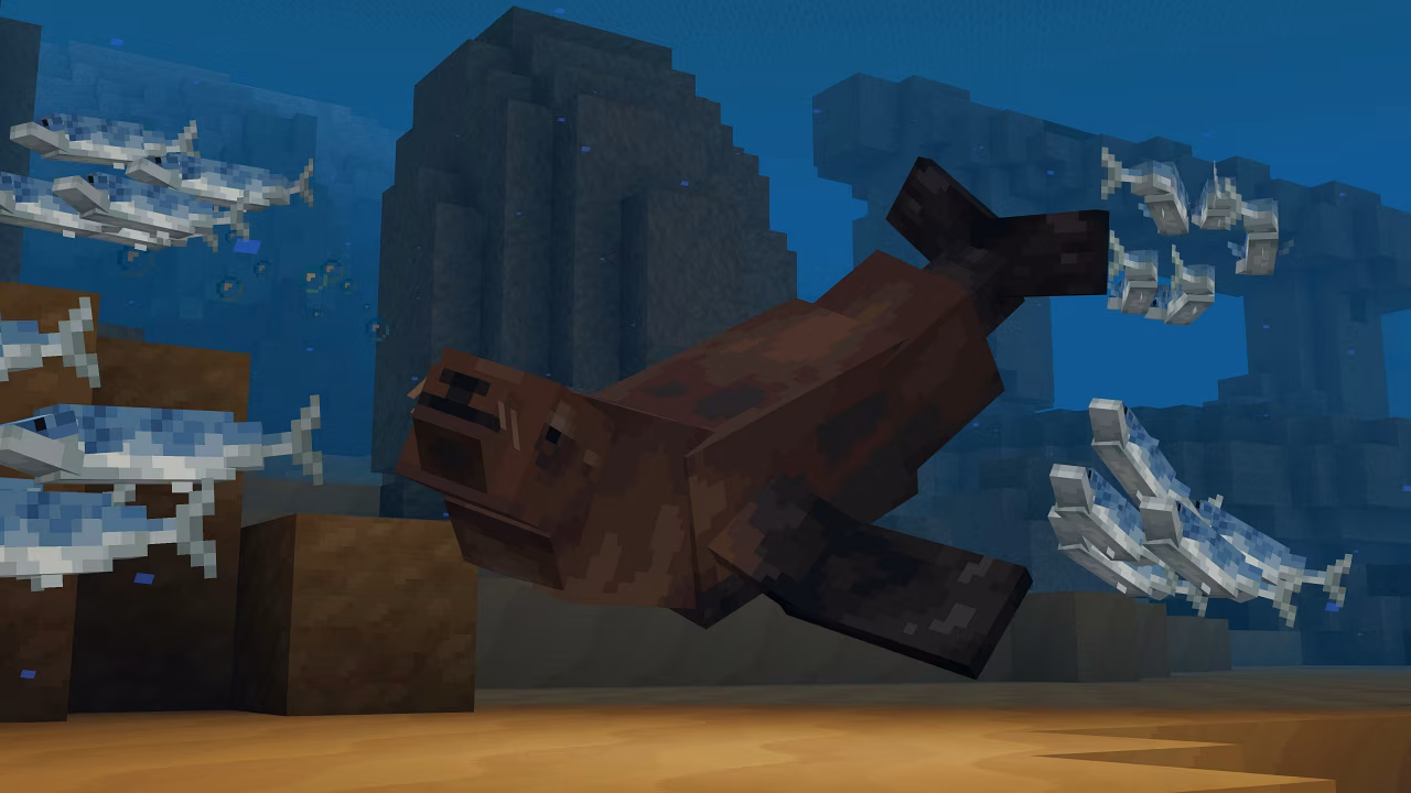 A screenshot of a fur seal underwater.