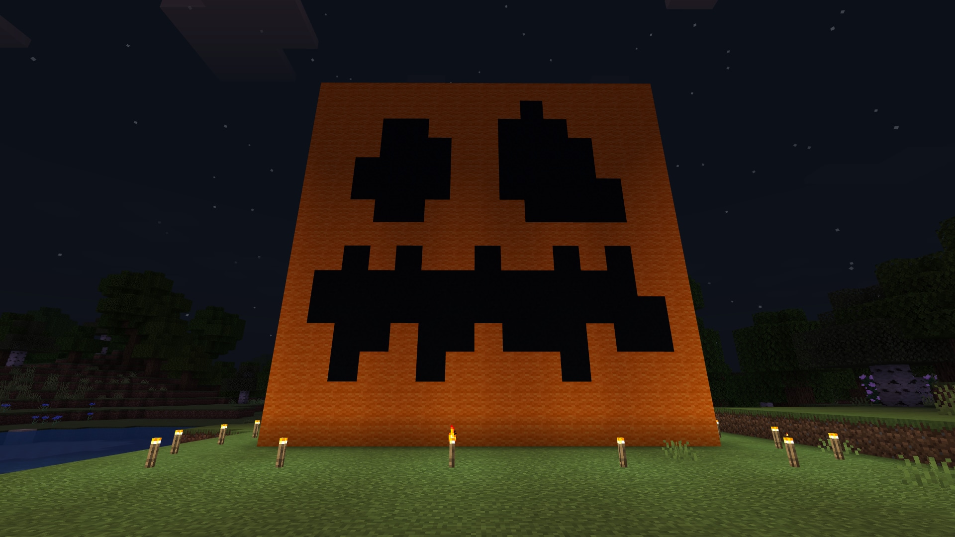 A large jack-o-lantern build in Minecraft