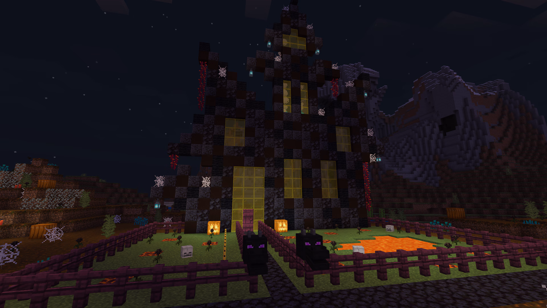 A dark castle with a fence and lava pond