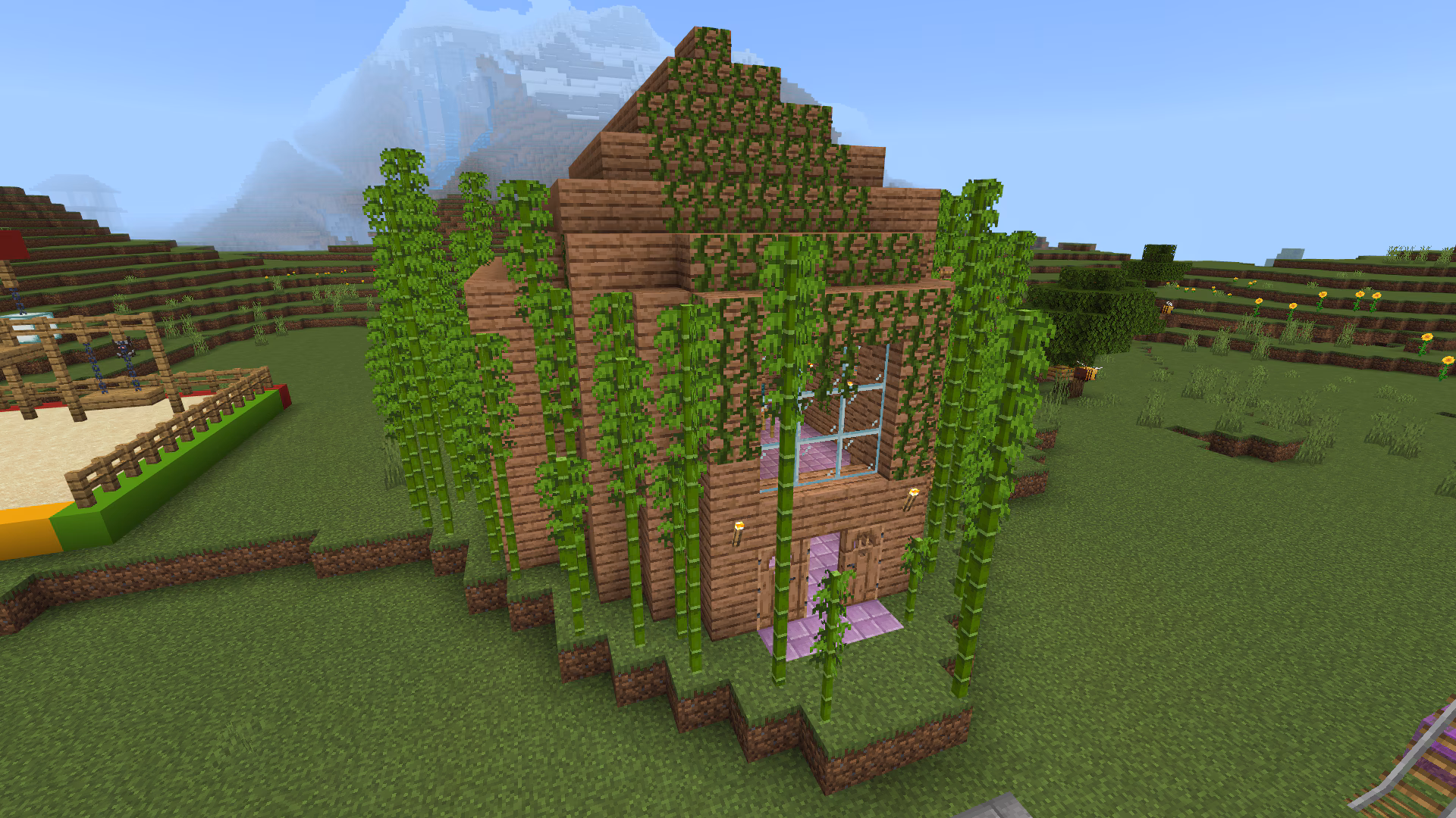 Image created in Minecraft of a jungle inspired club surrounded by tall bamboo