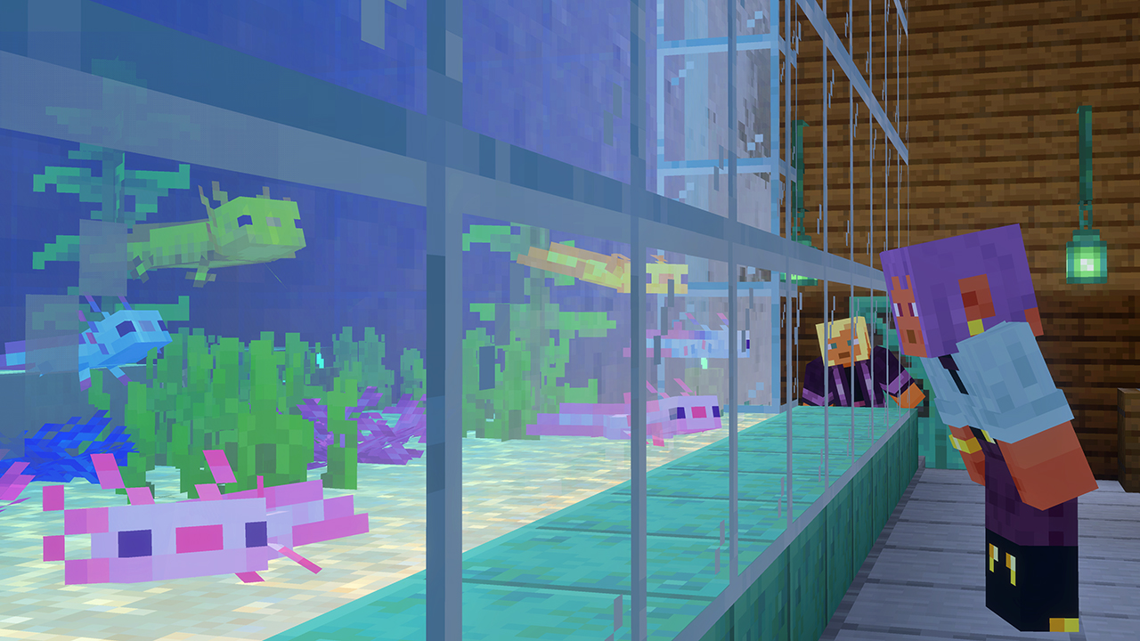 This screenshot shows the adorable baby axolotls