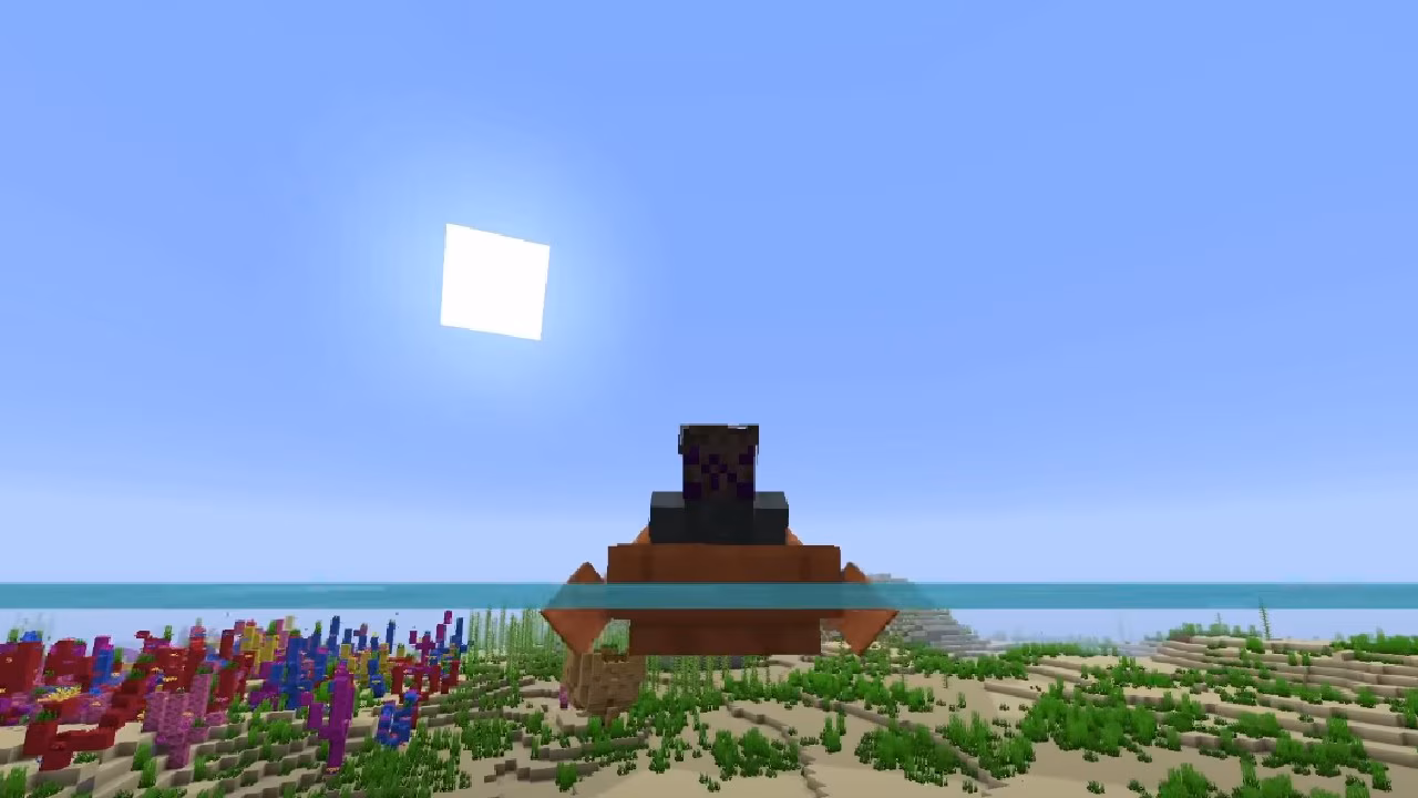 Image from Minecraft that's at water level, with sky and sun above, and coral with underwater greenery underneath. 