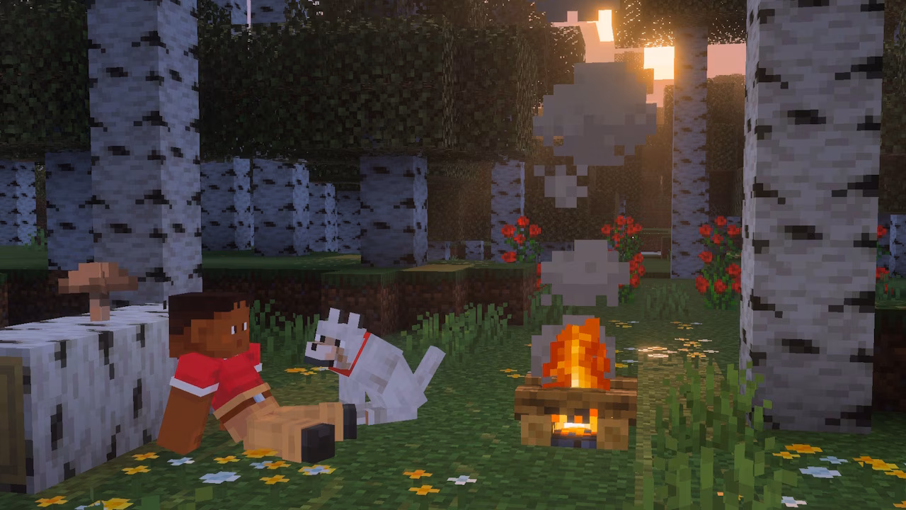 pic of person in a forest at night resting on the ground next to a campfire